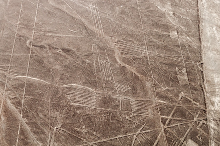 Aerial view of geoglyphs near Nazca - famous Nazca Lines, Peru. On the left side, Pelican figure is present (sometimes called Sea Birds figure).の写真素材
