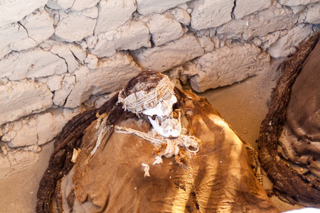 Preserved mummy in a tomb of Chauchilla cemetery in Nazca, Peruのeditorial素材