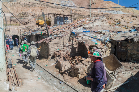 POTOSI, BOLIVIA - APRIL 20, 2015: Bolivian miners go to work inside Cerro Rico mine in Potosi, Bolivia.の写真素材