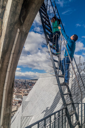 QUITO, ECUADOR - JUNE 24, 2015: People on their way to the tower of the Basilica of the National Vow in Quito, Ecuadorの写真素材