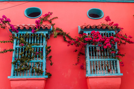 View of the windows of one of the colorful houses in center of Cartagena, Colombia.の写真素材