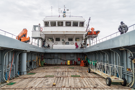 PUNTA ARENAS, CHILE - MARCH 4, 2015: Ferry Melinka leaving Penguin colony on Isla Magdalena island in Magellan Strait, Chileのeditorial素材
