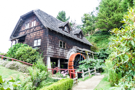 Old wooden water mill in Frutillar village, Chileのeditorial素材
