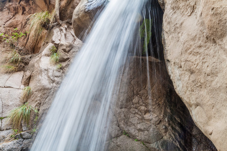 Detail of a waterfall in Quebrada del Colorado canyon near Cafayate, Argentinaの写真素材