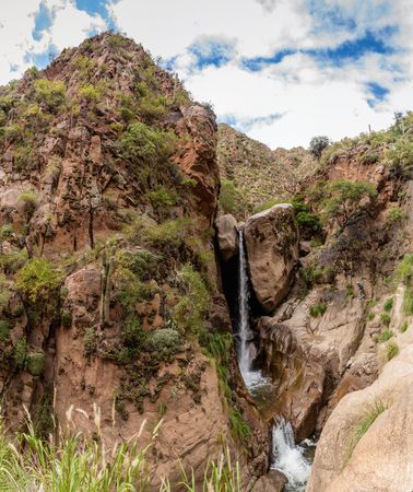 Tall waterfall in Quebrada del Colorado canyon near Cafayate, Argentinaの写真素材