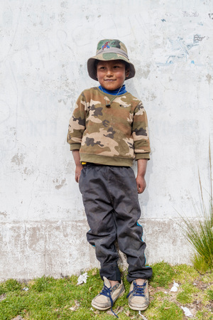 AMANTANI, PERU - MAY 15, 2015: Native boy in a village on Amantani island in Titicaca lake, Peruのeditorial素材