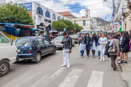 SUCRE, BOLIVIA - APRIL 22, 2015: Traffic in the center of Sucre, capital of Boliviaのeditorial素材