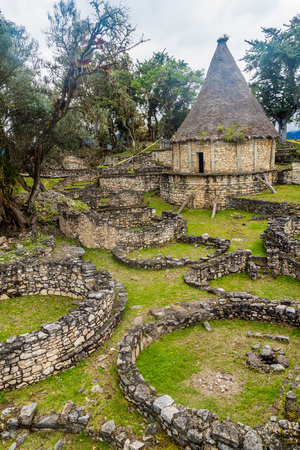 Ruins of round houses of Kuelap, ruined citadel city of Chachapoyas cloud forest culture in mountains of northern Peru.の写真素材