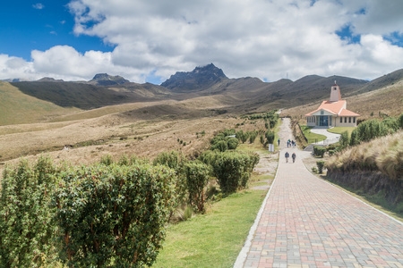 QUITO, ECUADOR - JUNE 25, 2015: Iglesia La Dolorosa church, Cruz Loma, Rucu Pichincha volcano in the backgroundの写真素材