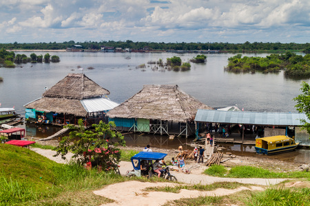 PADRE COCHA, PERU - JUNE 19, 2015: View of river port in village Padre Cocha near Iquitos, Peruのeditorial素材