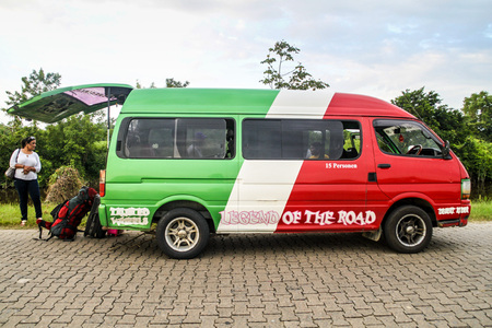 NIEUW NICKERIE, SURINAME - AUGUST 9, 2015: Van on a surinamese coastal road transporting passengers between capital and the border of Guyana.のeditorial素材