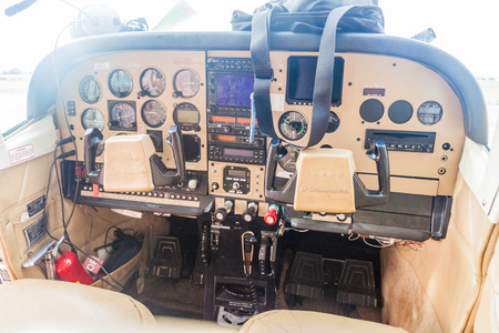 CIUDAD BOLIVAR, VENEZUELA - AUGUST 16, 2015: Cockpit of a small Cessna 210 Centurion airplane at the...