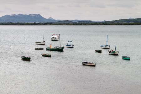 GIBARA,  CUBA - JAN 29, 2016: Boats in a harbor in Gibara village, Cubaの写真素材