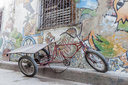 Bici taxi on a street in Camaguey, Cubaの写真素材