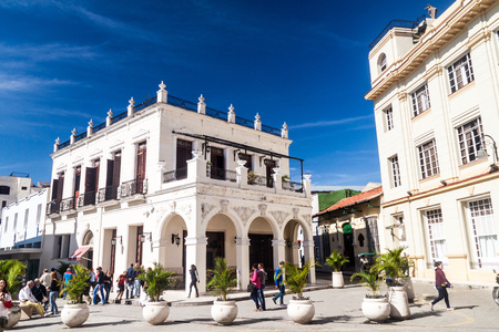 CAMAGUEY, CUBA - JAN 25, 2016: Ornate buildings on the Plaze de los Trabajadores square in the center of Camaguey.のeditorial素材