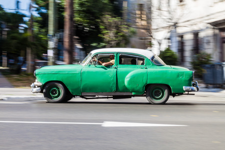 HAVANA, CUBA - FEB 21, 2016: Vintage car rides on the street in Havana.のeditorial素材