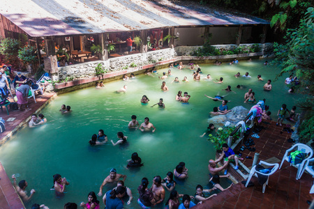 FUENTES GEORGINAS, GUATEMALA - MARCH 22, 2016: People bathing in a thermal pool Funtes Georginas.のeditorial素材