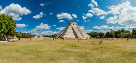CHICHEN ITZA, MEXICO - FEB 26, 2016: Crowds of tourists visit the Kukulkan pyramid at the archeological site Chichen Itza.のeditorial素材
