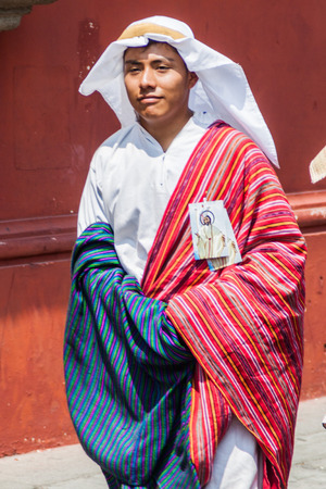ANTIGUA, GUATEMALA - MARCH 27, 2016: Participant of the procession on Easter Sunday in Antigua Guatemala city.のeditorial素材