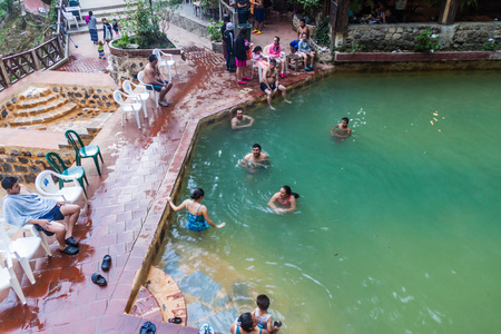 FUENTES GEORGINAS, GUATEMALA - MARCH 21, 2016: People bathing in a thermal pool Funtes Georginas.のeditorial素材