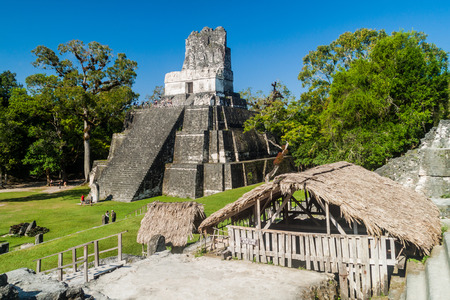 TIKAL, GUATEMALA - MARCH 14, 2016: Tourists visit Grand Plaza at the archaeological site Tikal, Guatemalaのeditorial素材