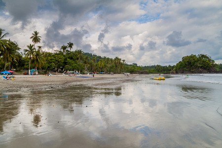 MANUEL ANTONIO, COSTA RICA - MAY 13, 2016: People on a beach in Manuel Antonio village, Costa Ricaのeditorial素材