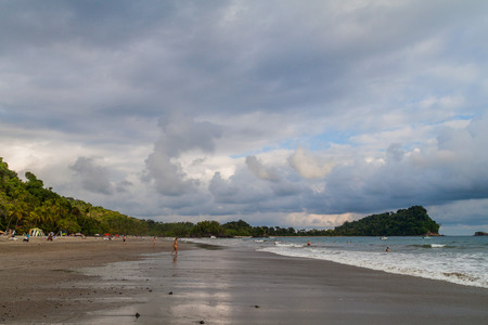 MANUEL ANTONIO, COSTA RICA - MAY 13, 2016: People on a beach in Manuel Antonio village, Costa Ricaのeditorial素材