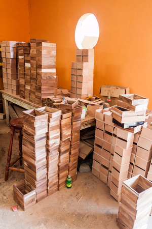 ESTELI, NICARAGUA - APRIL 21, 2016: Wooden boxes for cigars in Tabacalera Santiago cigar factory in Esteli.のeditorial素材