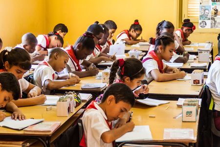 SANTIAGO DE CUBA,  CUBA - FEB 1, 2016: Children in the classroom in the former La Moncada baracks,...