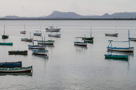 GIBARA,  CUBA - JAN 29, 2016: Boats in a harbor in Gibara village, Cubaのeditorial素材