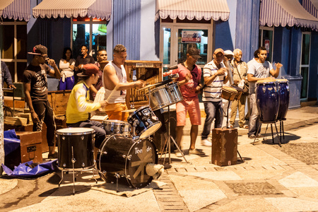 BAYAMO, CUBA - JAN  30, 2016: Local music band performs on a pedestrian street in Bayamo.のeditorial素材