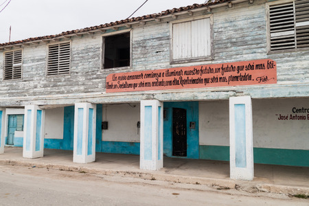 GIBARA,  CUBA - JAN 29, 2016: Fidel Castro's quote on a building in Gibara villageのeditorial素材