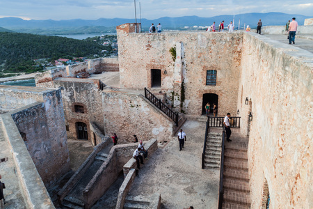 SANTIAGO DE CUBA,  CUBA - FEB 1, 2016:  Tourists visit the Castle San Pedro de la Roca del Morro,...