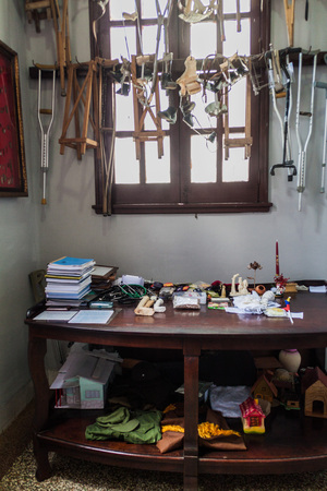 EL COBRE,  CUBA - FEB 1, 2016: Collection of the offerings giving thanks for favor bestowed by the Virgin (Our Lady of Charity). Church in El Cobre village, Cubaのeditorial素材
