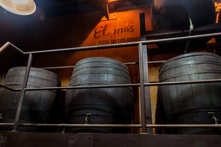 HAVANA, CUBA - FEB 23, 2016: Wooden rum barrels in an exposition of Museo del Ron (Rum Museum) in...