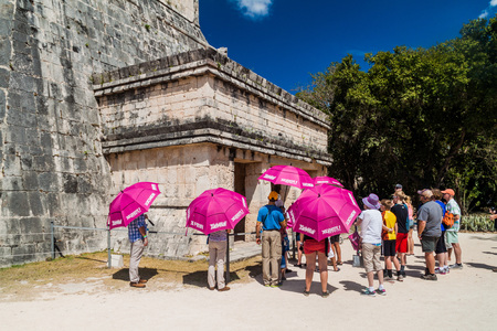 CHICHEN ITZA, MEXICO - FEB 26, 2016: Crowds of tourists visit the Jaguar Temple at the archeological site Chichen Itza.のeditorial素材