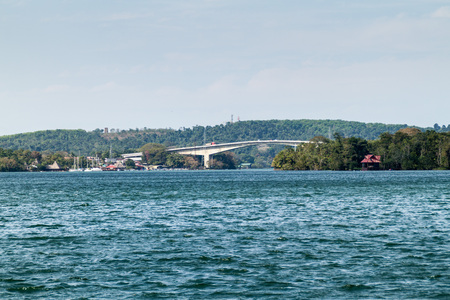Bridge over Rio Dulce river in Fronteras town, Guatemalaの写真素材