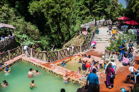 FUENTES GEORGINAS, GUATEMALA - MARCH 22, 2016: People bathing in a thermal pool Funtes Georginas.のeditorial素材