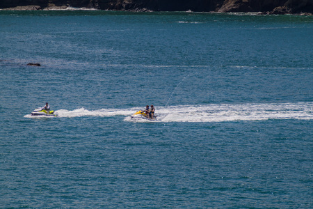MANUEL ANTONIO, COSTA RICA - MAY 13, 2016: Jet ski riders in National Park Manuel Antonio, Costa Ricaのeditorial素材
