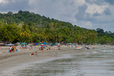 MANUEL ANTONIO, COSTA RICA - MAY 13, 2016: People on a beach in Manuel Antonio village, Costa Ricaのeditorial素材