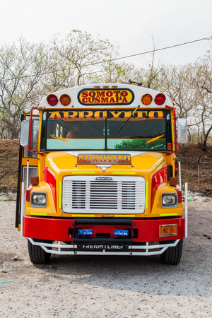 SOMOTO, NICARAGUA - APRIL 24, 2016: Colourful chicken bus, former US school bus, at the bus terminal in Somoto town.のeditorial素材