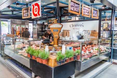 COPENHAGEN, DENMARK - AUGUST 28, 2016: Butcher stall inTorvehallerne indoor food market in the centre of Copenhagen.のeditorial素材