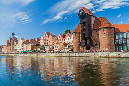 GDANSK, POLAND - SEPTEMBER 2, 2016: Riverside houses by Motlawa river in Gdansk, Poland. Medieval...