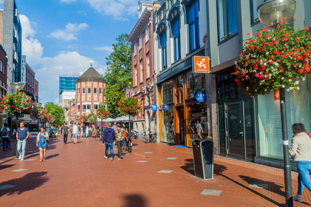 EINDHOVEN, NETHERLANDS - AUGUST 29, 2016: People walk at the pedestrian street in the center of Eindhoven, Netherlands.のeditorial素材