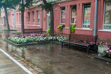 KAUNAS, LITHUANIA - AUGUST 16, 2016: Flowerbeds and benches on Laisves aleja street in Kaunas, Lithuania.のeditorial素材