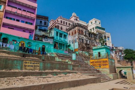 VARANASI, INDIA - OCTOBER 25, 2016: View of houses at sacred river Ganges riverfront in Varanasi, Indiaのeditorial素材