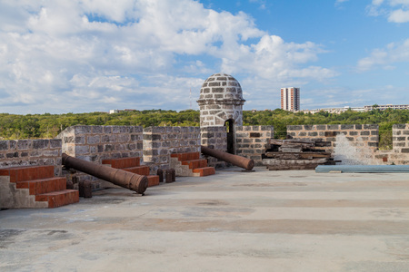 View of Castillo de Jagua castle, Cuba. Ciudad Nuclear (Nuclear City) in the background.