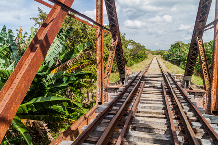 Railway bridge over Ay river in Valle de los Ingenios valley near Trinidad, Cubaの写真素材