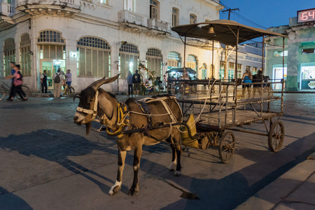 SANTA CLARA, CUBA - FEB 13, 2016: Goat carriage for children at Parque Vidal square in the center of Santa Clara, Cuba.のeditorial素材