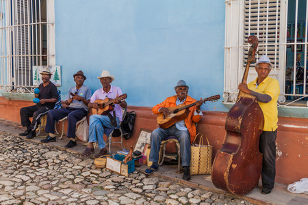 TRINIDAD, CUBA - FEB 8, 2016: Group of local musicians plays on a street in the center of Trinidad, Cuba.のeditorial素材